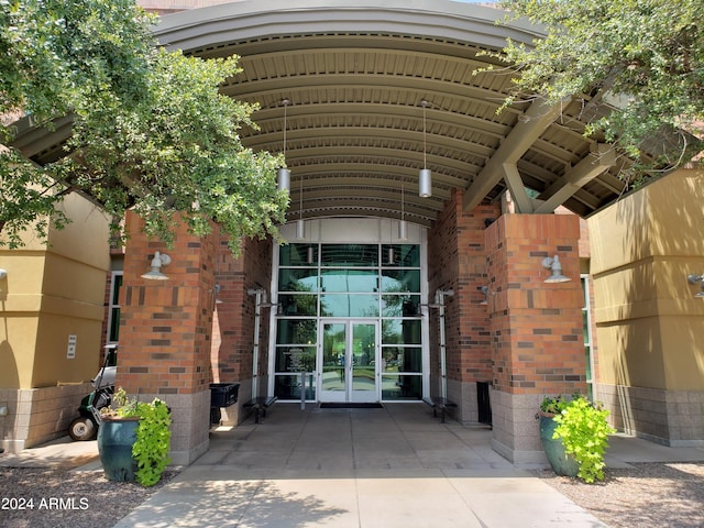 entrance to property featuring french doors