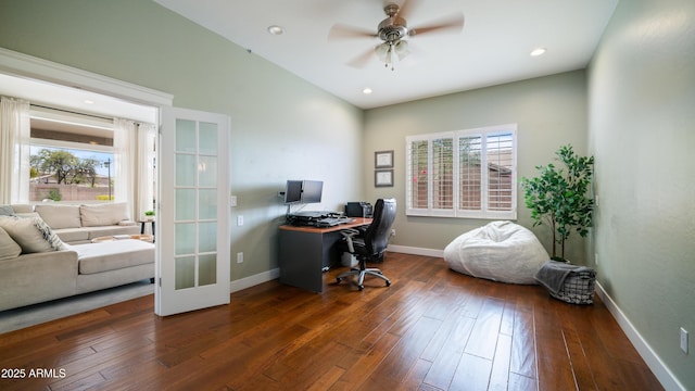 office with dark wood finished floors, a healthy amount of sunlight, and baseboards