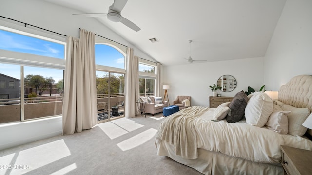 bedroom with access to outside, multiple windows, carpet, and visible vents