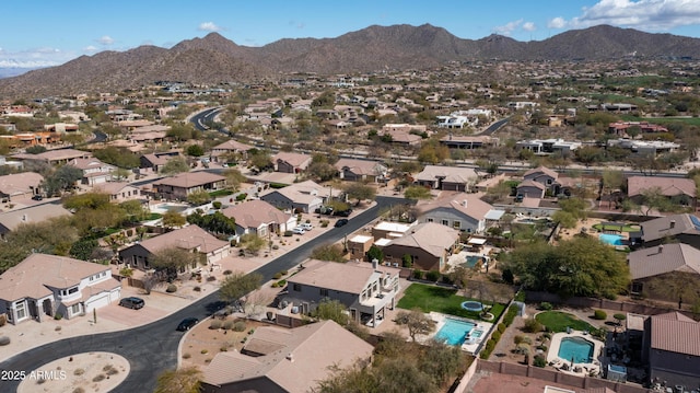 drone / aerial view with a mountain view and a residential view