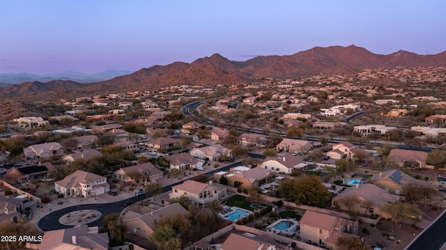 bird's eye view with a residential view and a mountain view