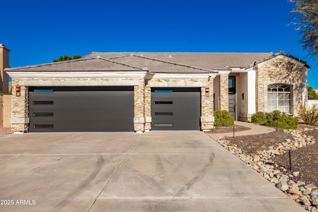 view of front of home with a garage