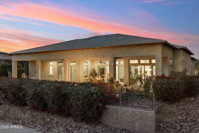 17413 E Hidden Green Ct, Rio Verde, AZ 85263 - back of house at dusk with stucco siding
