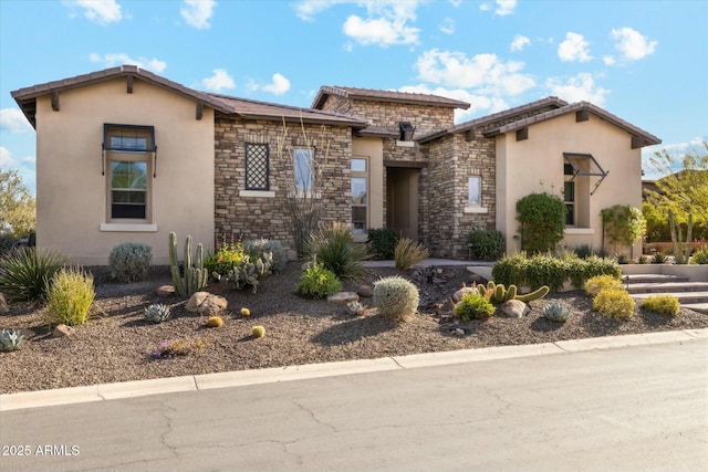 17413 E Hidden Green Ct, Rio Verde, AZ 85263 - view of front of home with stucco siding and stone siding