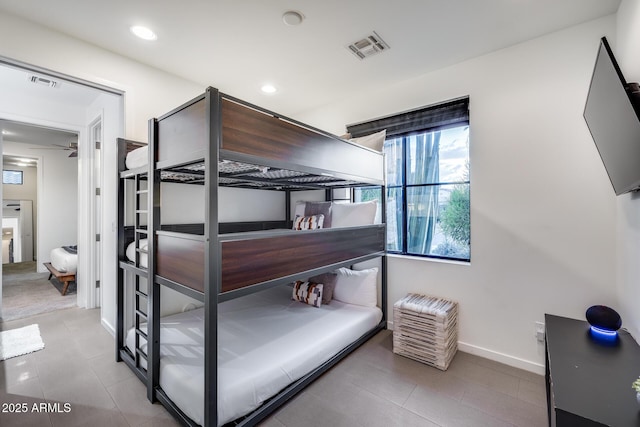 tiled bedroom with visible vents, recessed lighting, and baseboards