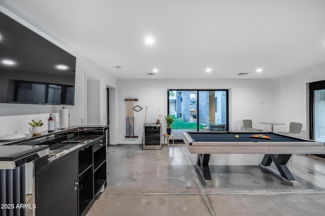recreation room with beverage cooler, billiards, recessed lighting, and finished concrete floors