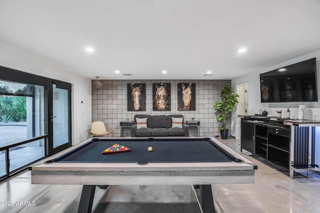 recreation room featuring finished concrete floors, billiards, and recessed lighting