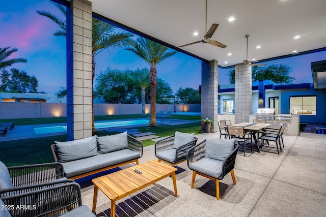 view of patio with a fenced backyard, outdoor dining space, area for grilling, and outdoor lounge area