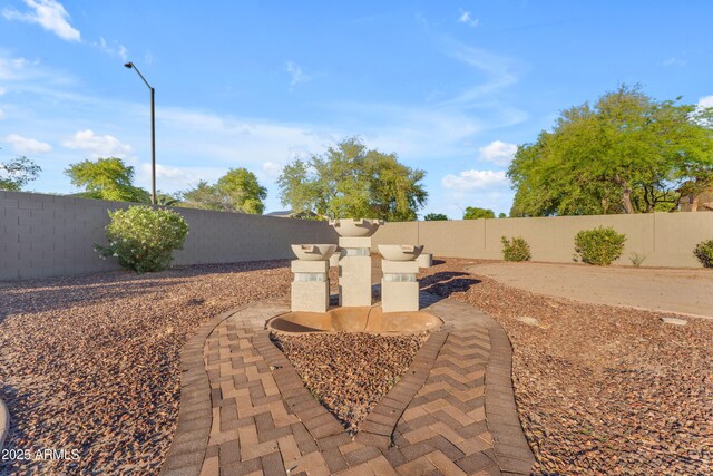 view of yard featuring a fenced backyard and a patio area