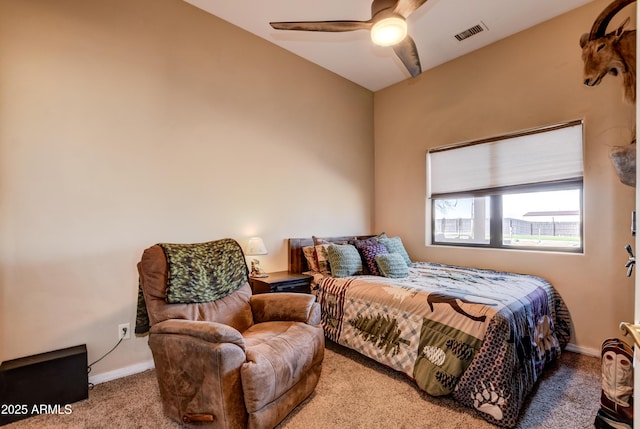 bedroom featuring carpet floors, baseboards, visible vents, and a ceiling fan