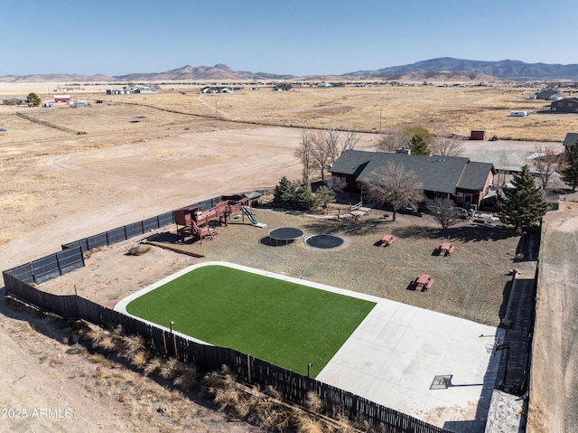 aerial view featuring a rural view and a mountain view