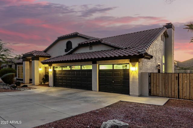 view of front of property with a garage