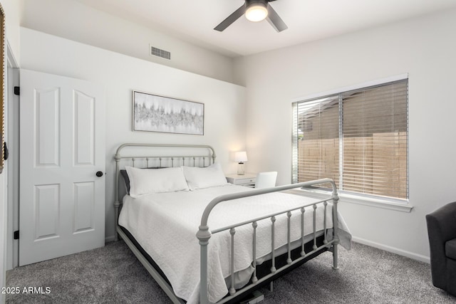 bedroom with ceiling fan and carpet floors