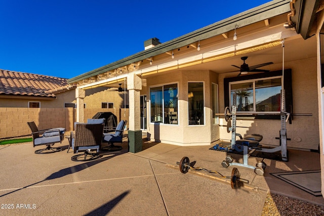 view of patio with ceiling fan