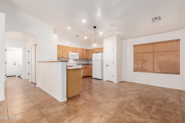 kitchen with white appliances, hanging light fixtures, lofted ceiling, and light tile patterned flooring