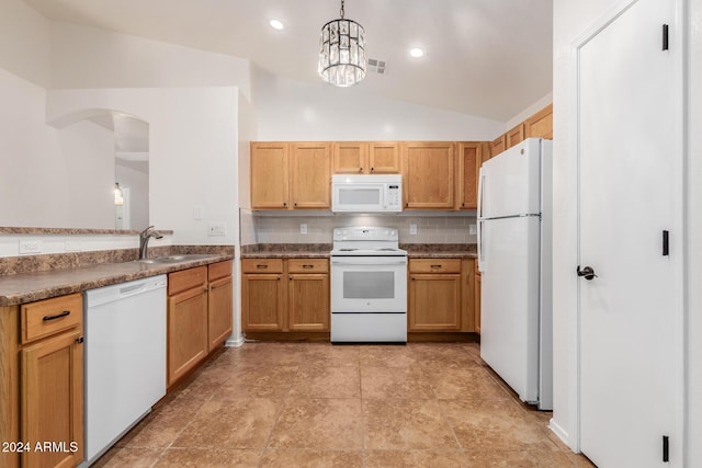 kitchen featuring white appliances, vaulted ceiling, sink, pendant lighting, and an inviting chandelier