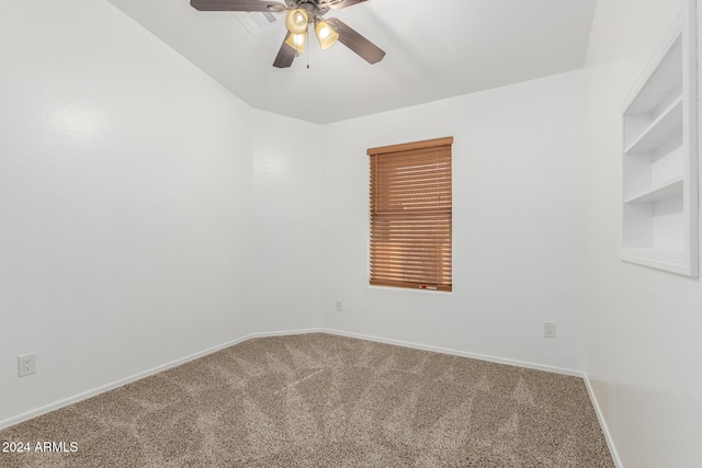 empty room featuring carpet flooring and ceiling fan