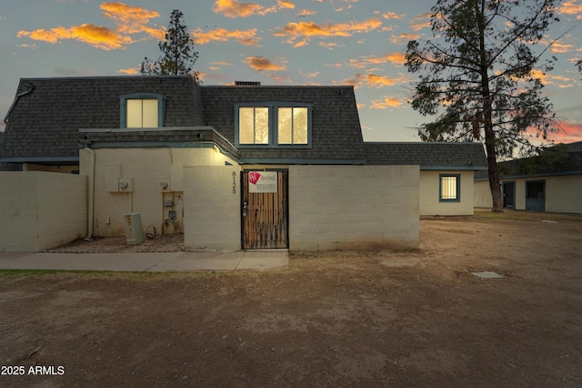 8125 N 32nd Dr, Phoenix, AZ 85051 - view of front facade with a shingled roof and mansard roof