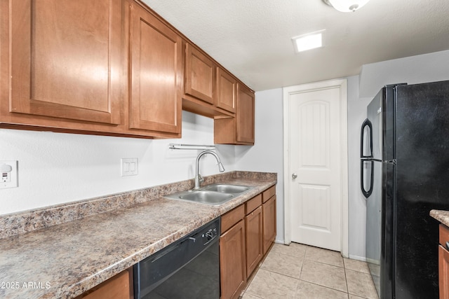 8125 N 32nd Dr, Phoenix, AZ 85051 - kitchen featuring black appliances, a sink, brown cabinets, and light tile patterned flooring