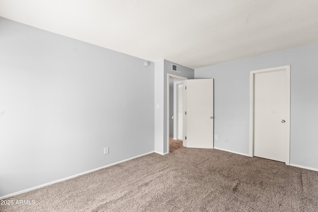8125 N 32nd Dr, Phoenix, AZ 85051 - unfurnished bedroom with carpet and baseboards