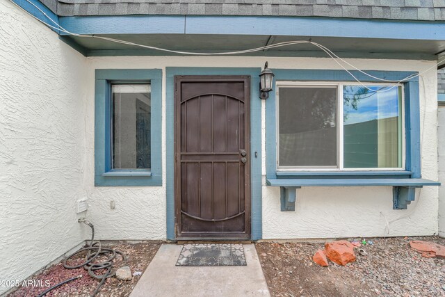 8125 N 32nd Dr, Phoenix, AZ 85051 - entrance to property featuring stucco siding