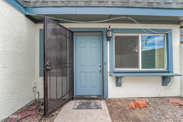 8125 N 32nd Dr, Phoenix, AZ 85051 - property entrance with stucco siding