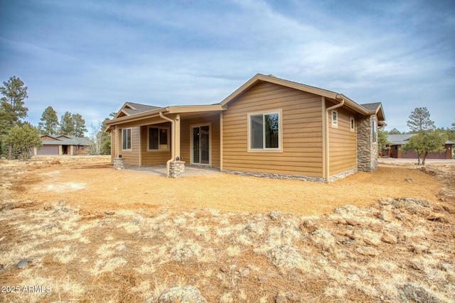 5974 E Elk Spgs, Lakeside, AZ 85929 - rear view of house featuring a patio