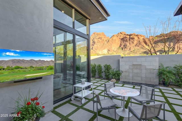 view of patio / terrace with fence