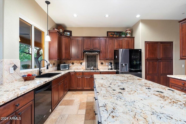 kitchen with black appliances, sink, backsplash, decorative light fixtures, and light stone counters