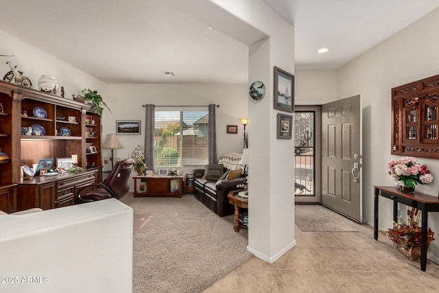 office space with built in desk, recessed lighting, visible vents, light carpet, and baseboards