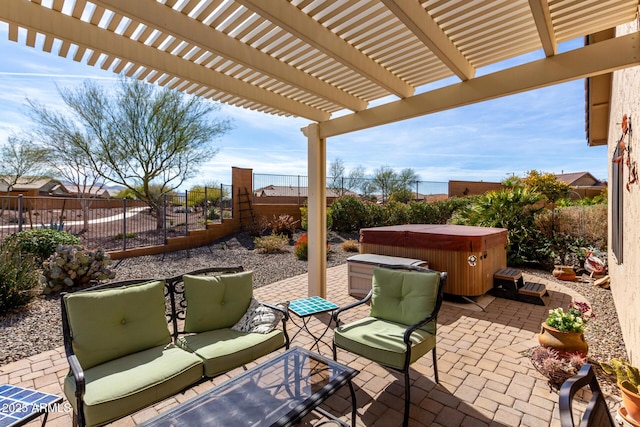 view of patio with an outdoor living space, a fenced backyard, a hot tub, and a pergola