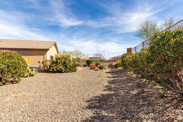 view of yard featuring fence