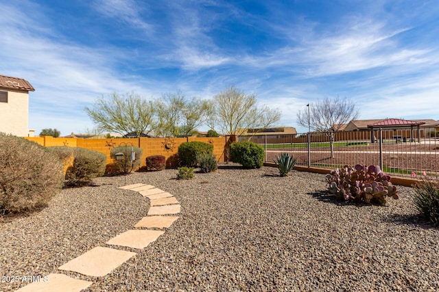 view of yard featuring a fenced backyard