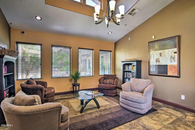 9450 E Becker Ln Unit 2067, Scottsdale, AZ 85260 - living area with a chandelier, lofted ceiling, and stone finish flooring