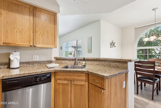 9450 E Becker Ln Unit 2067, Scottsdale, AZ 85260 - kitchen with stainless steel dishwasher, a peninsula, plenty of natural light, and light tile patterned floors