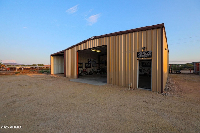 view of outdoor structure at dusk