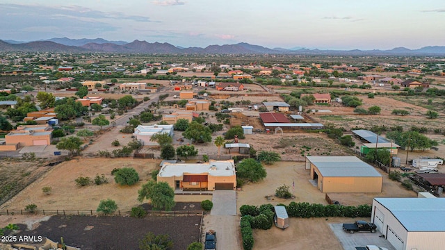 aerial view at dusk with a mountain view