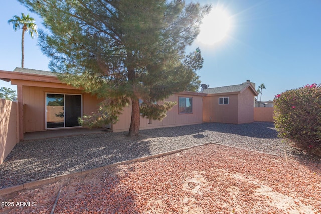 rear view of house with a patio