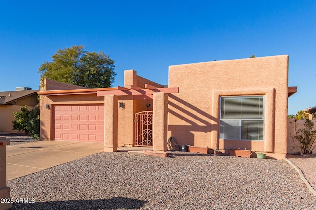 southwest-style home featuring a garage