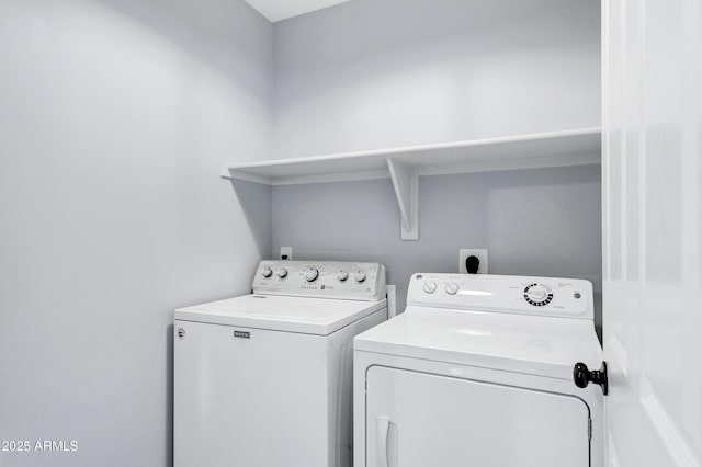 laundry area featuring laundry area and washing machine and dryer