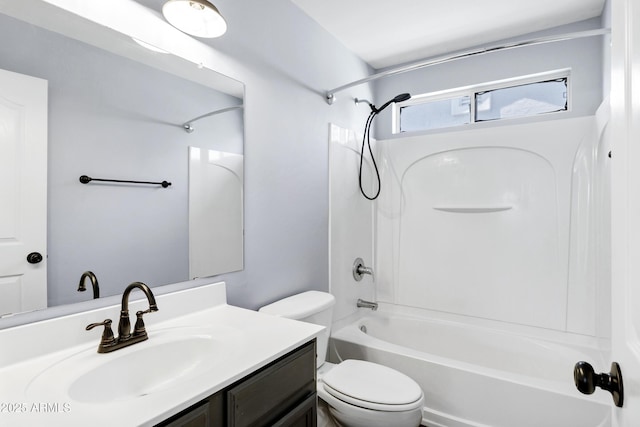 full bathroom featuring shower / bath combination, toilet, and vanity