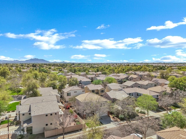 birds eye view of property with a residential view and a mountain view