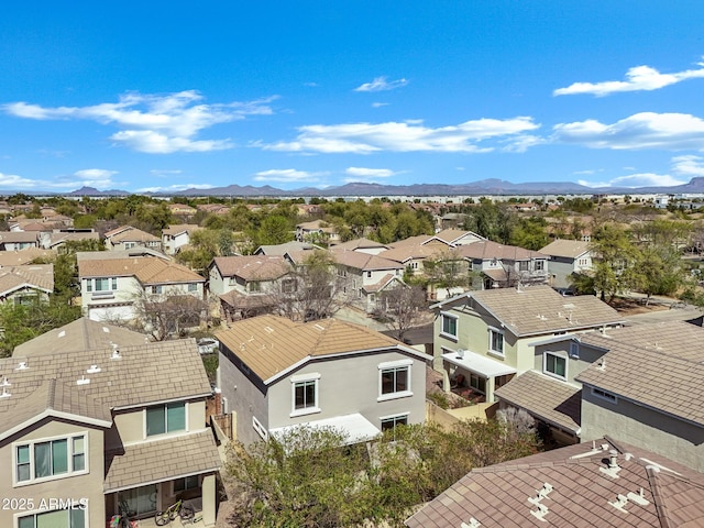 aerial view featuring a mountain view and a residential view