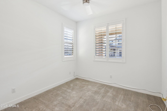 unfurnished room with carpet floors and ceiling fan