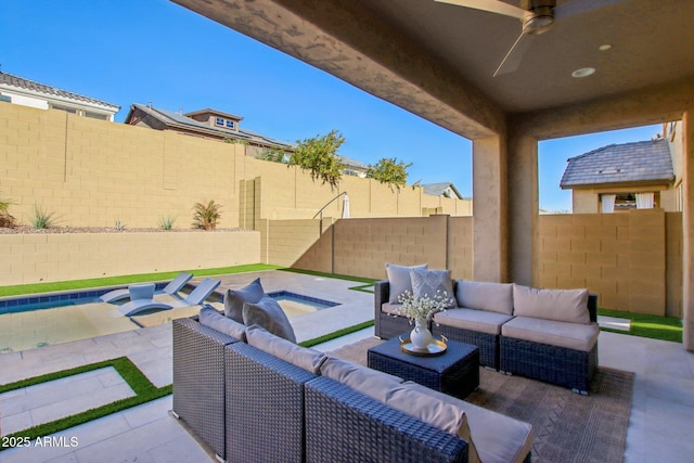 view of patio featuring a swimming pool with hot tub, ceiling fan, and outdoor lounge area