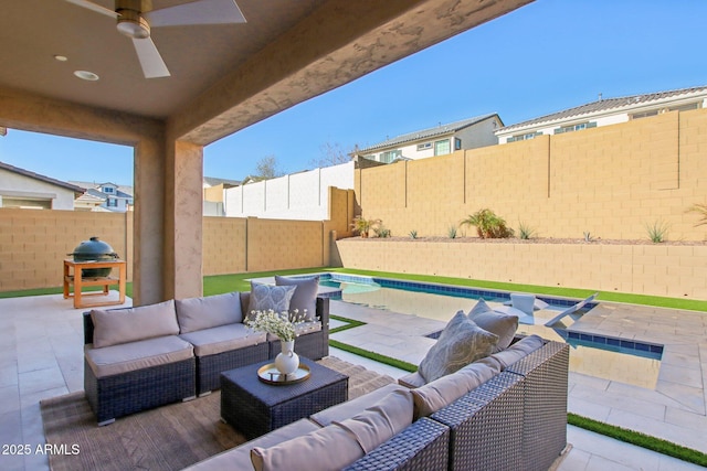 view of patio / terrace with ceiling fan and outdoor lounge area