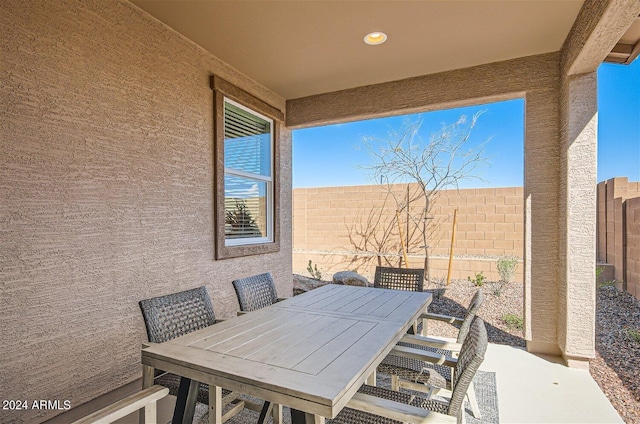 view of patio / terrace with outdoor dining area and a fenced backyard