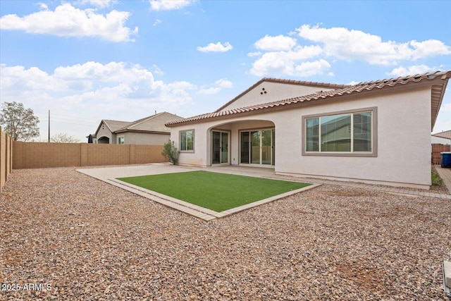 rear view of property with a patio