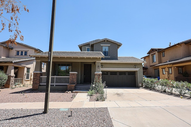 15365 W Valentine St, Surprise, AZ 85379 - craftsman-style house with a porch, stucco siding, concrete driveway, and stone siding