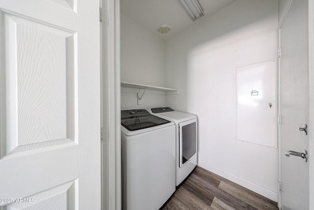 15365 W Valentine St, Surprise, AZ 85379 - laundry room with separate washer and dryer, dark wood-type flooring, and baseboards
